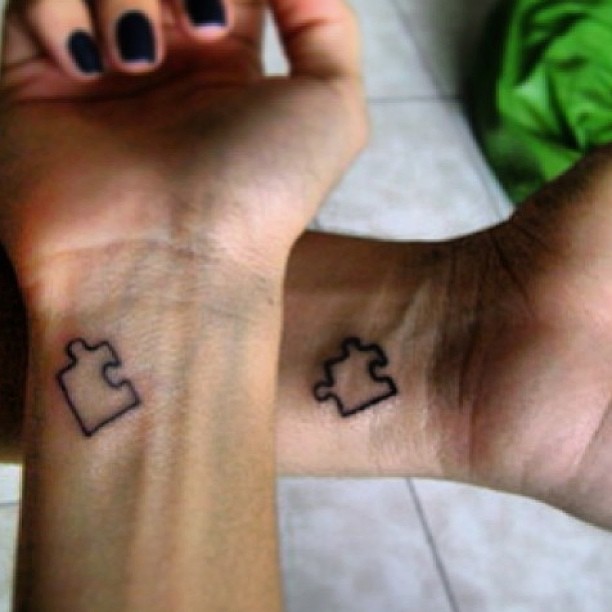 Tattoo puzzle couple