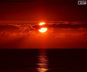 Puzzle coucher de soleil sur la mer