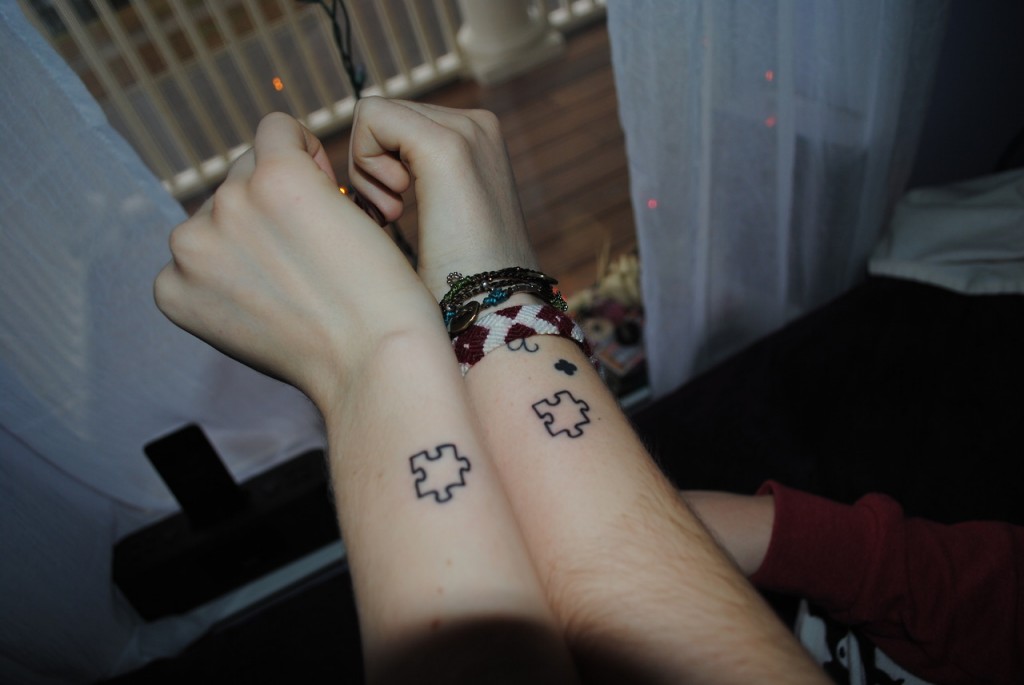 Tattoo puzzle couple